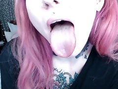 pink haired girl holds mouth wide open for you )